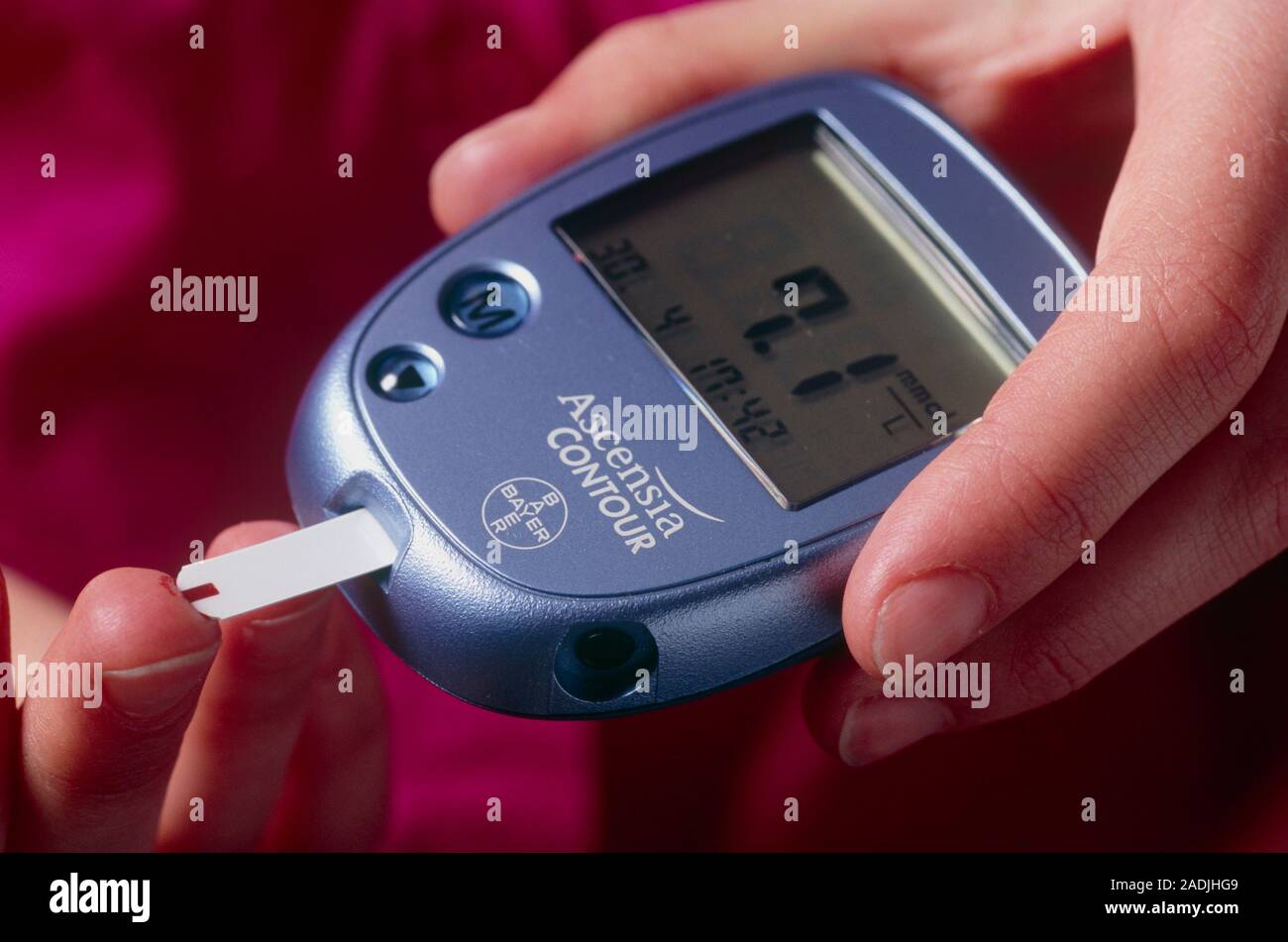 Blood glucose measurement being performed by a diabetic. A drop of