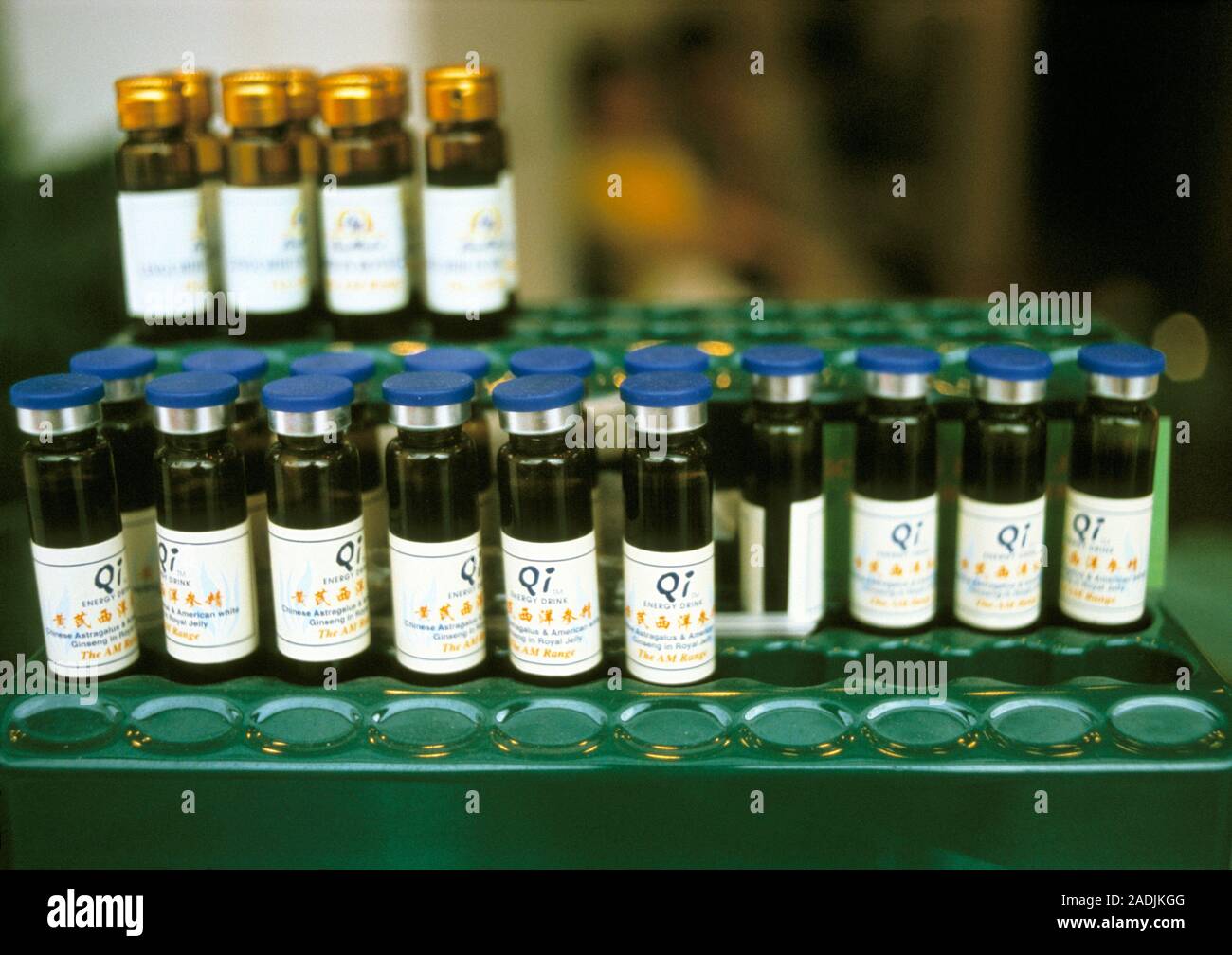 Chinese herbal medicine. Bottles (blue caps) of a Chinese herbal energy