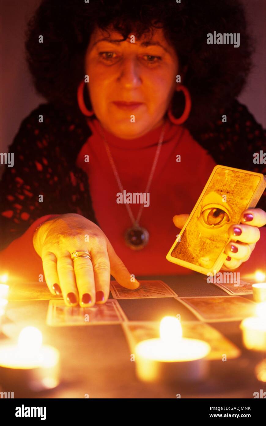 Fortune telling. Fortune teller lying out tarot cards to do a reading