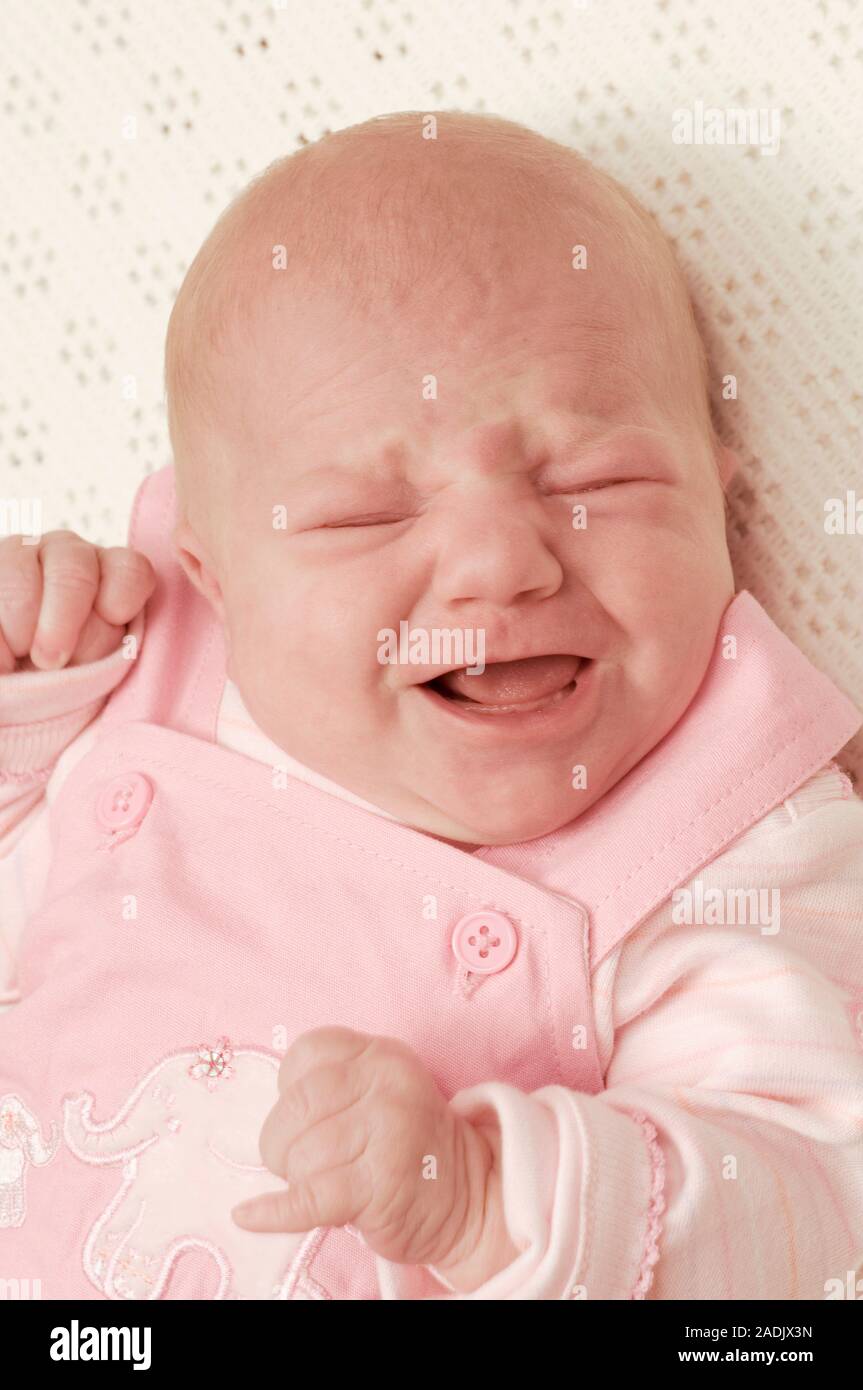 MODEL RELEASED. Crying baby girl. She is one week old Stock Photo - Alamy