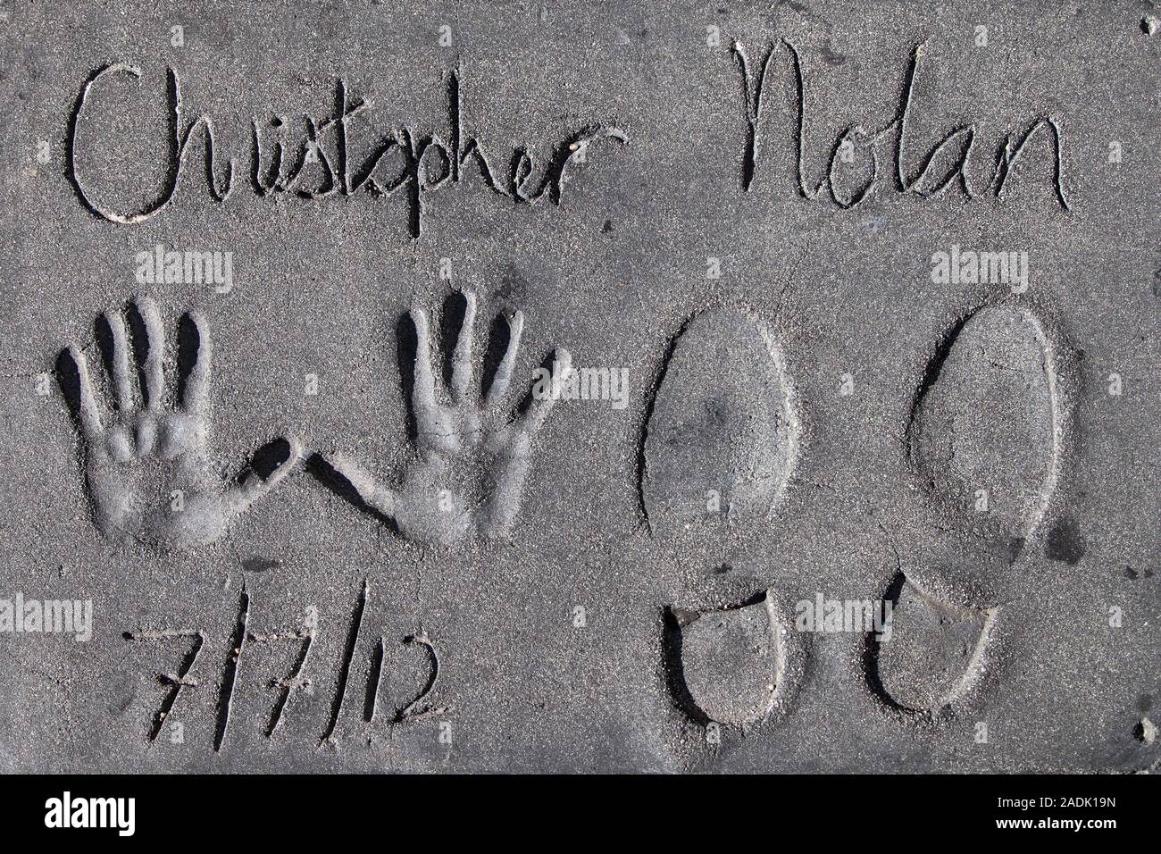 Los Angeles, California - September 06, 2019: Hand and footprints of filmmaker Christopher Nolan in the Grauman's Chinese Theatre forecourt, Hollywood. Stock Photo