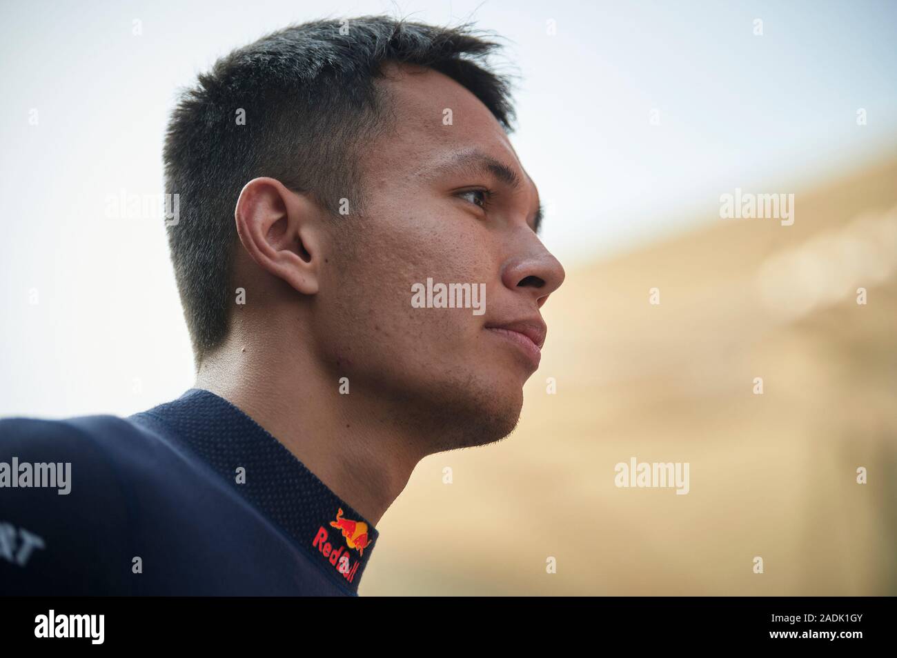Red Bull Racing’s Thai driver Alexander Albon arrives for the drivers parade ahead of the Abu Dhabi F1 Grand Prix race at the Yas Marina Circuit in Abu Dhabi. Stock Photo