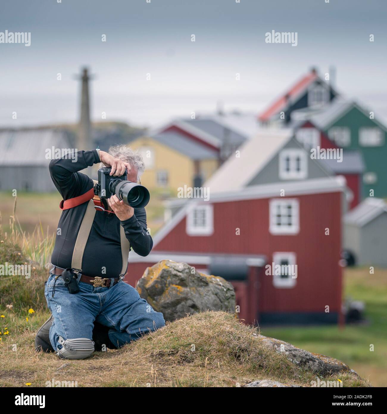 Photographer taking pictures, Westfjords, Iceland Stock Photo
