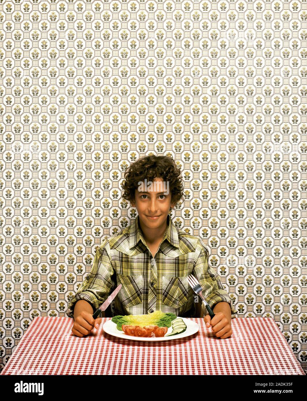 child about to eat at table Stock Photo