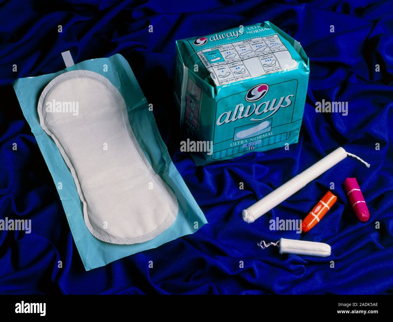 Sanitary towels & tampons. Assortment of sanitary towels and rodshaped