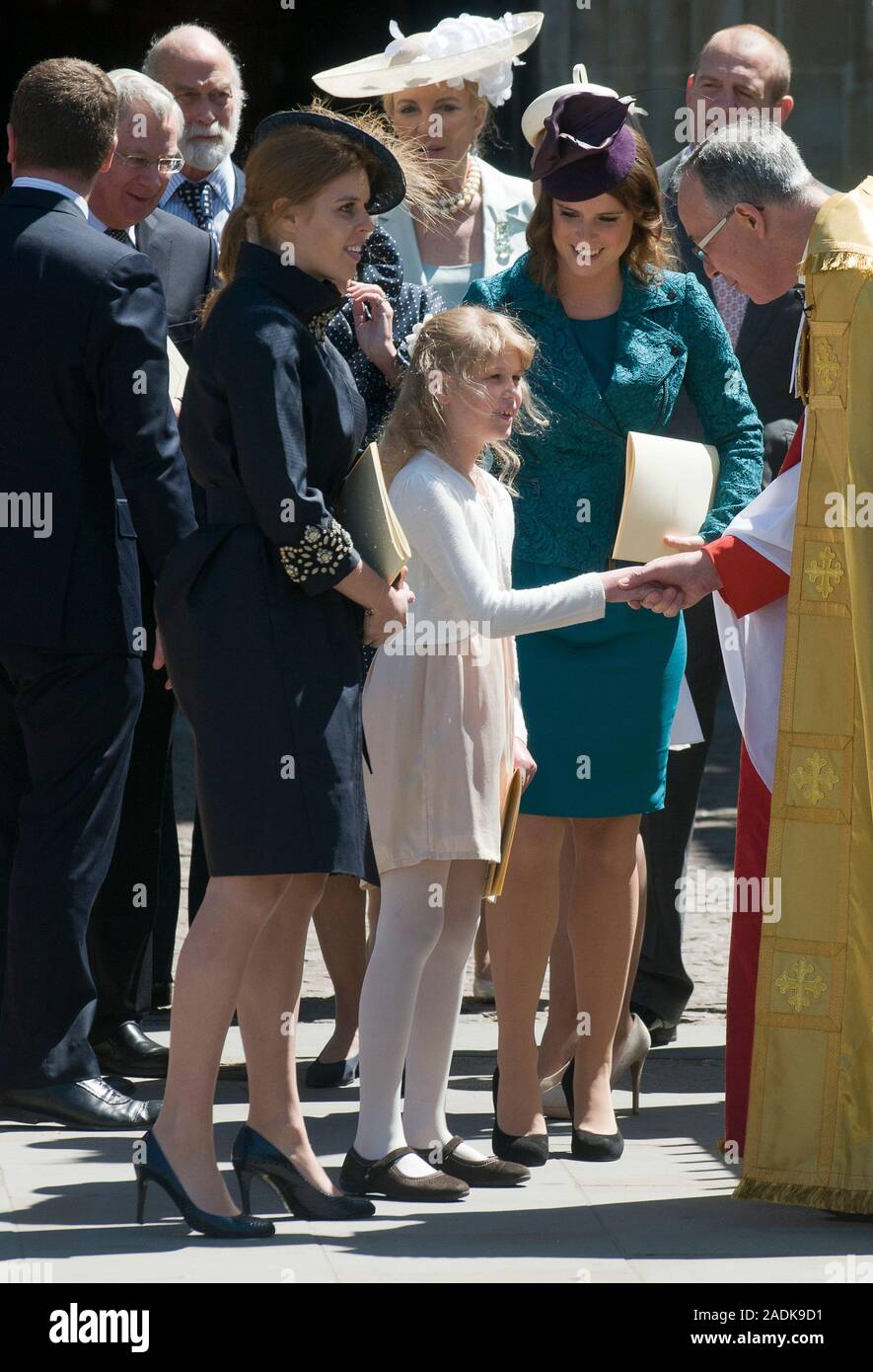 Princess Eugenie and Beatrice with Lady Louise Windsor join  The Queen  at Westminster Abbey for a ceremony to mark the 60th anniversary of her coronation in 1953. Accompanied by the Duke of Edinburgh, Prince Charles and the Duchess of Cornwall, the Duke and Duchess of Cambridge, and other members of the Royal Family June 2013. Stock Photo