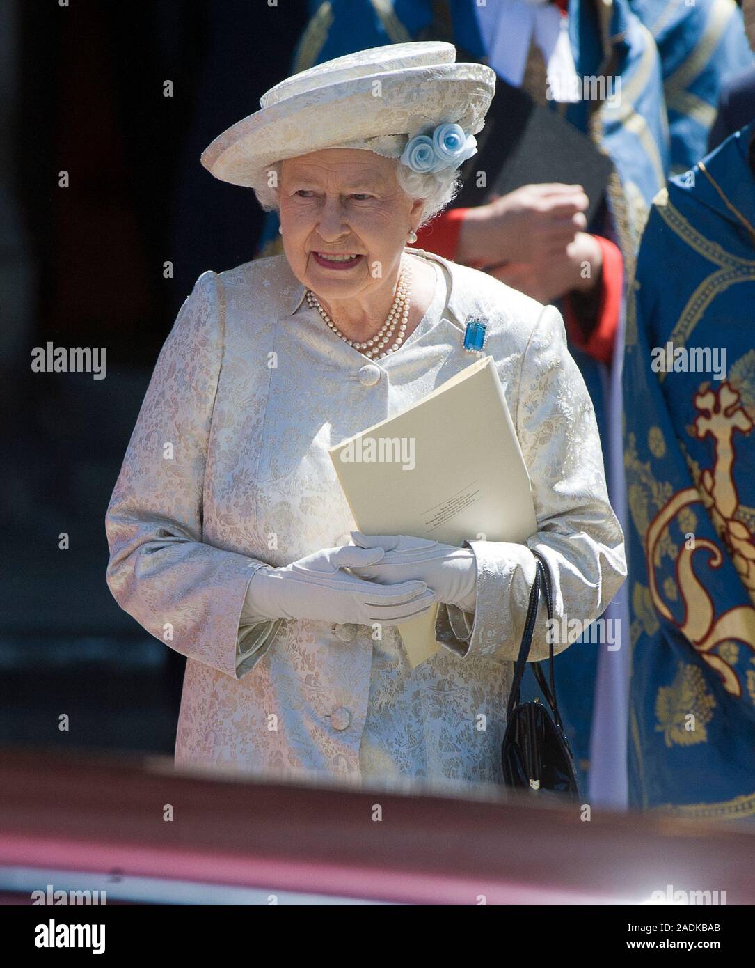 H.M. The Queen arriving at Westminster Abbey for a ceremony to mark the 60th anniversary of her coronation in 1953. Accompanied by the Duke of Edinburgh, Prince Charles and the Duchess of Cornwall, the Duke and Duchess of Cambridge,Prince Harry and other members of the Royal Family in June 2013. Stock Photo