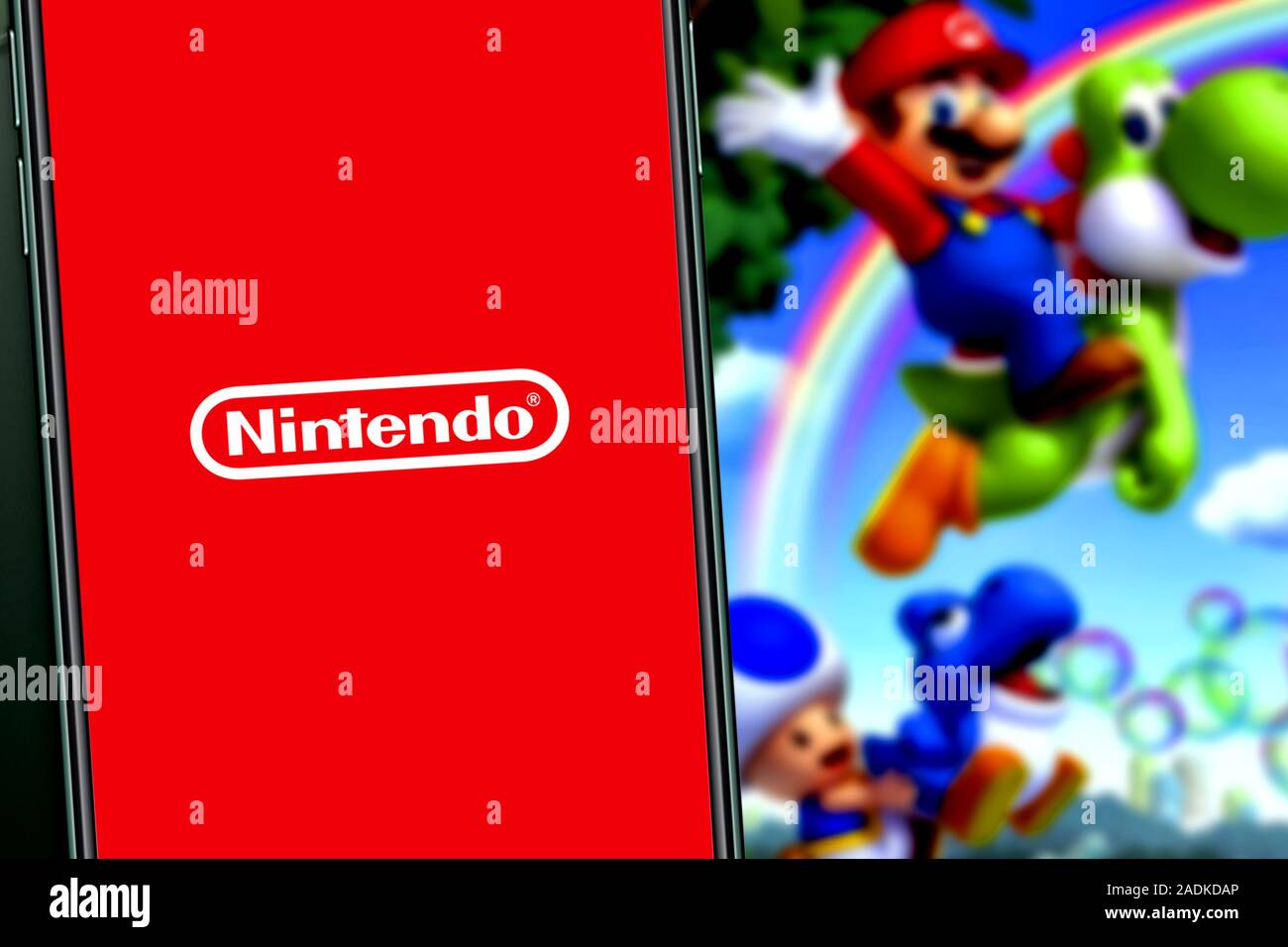 Smart phone with the MARIO KART TOUR logo, is a popular game for phones.  United States, Canada, December 4, 2019 Stock Photo - Alamy