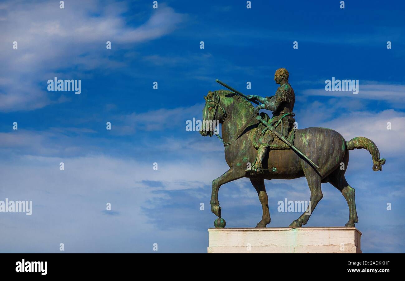 Gattamelata bronze equestrian statue among clouds, in the historic center of Padua, erected by the famous renaissance artist Donatello in 1453 (with c Stock Photo