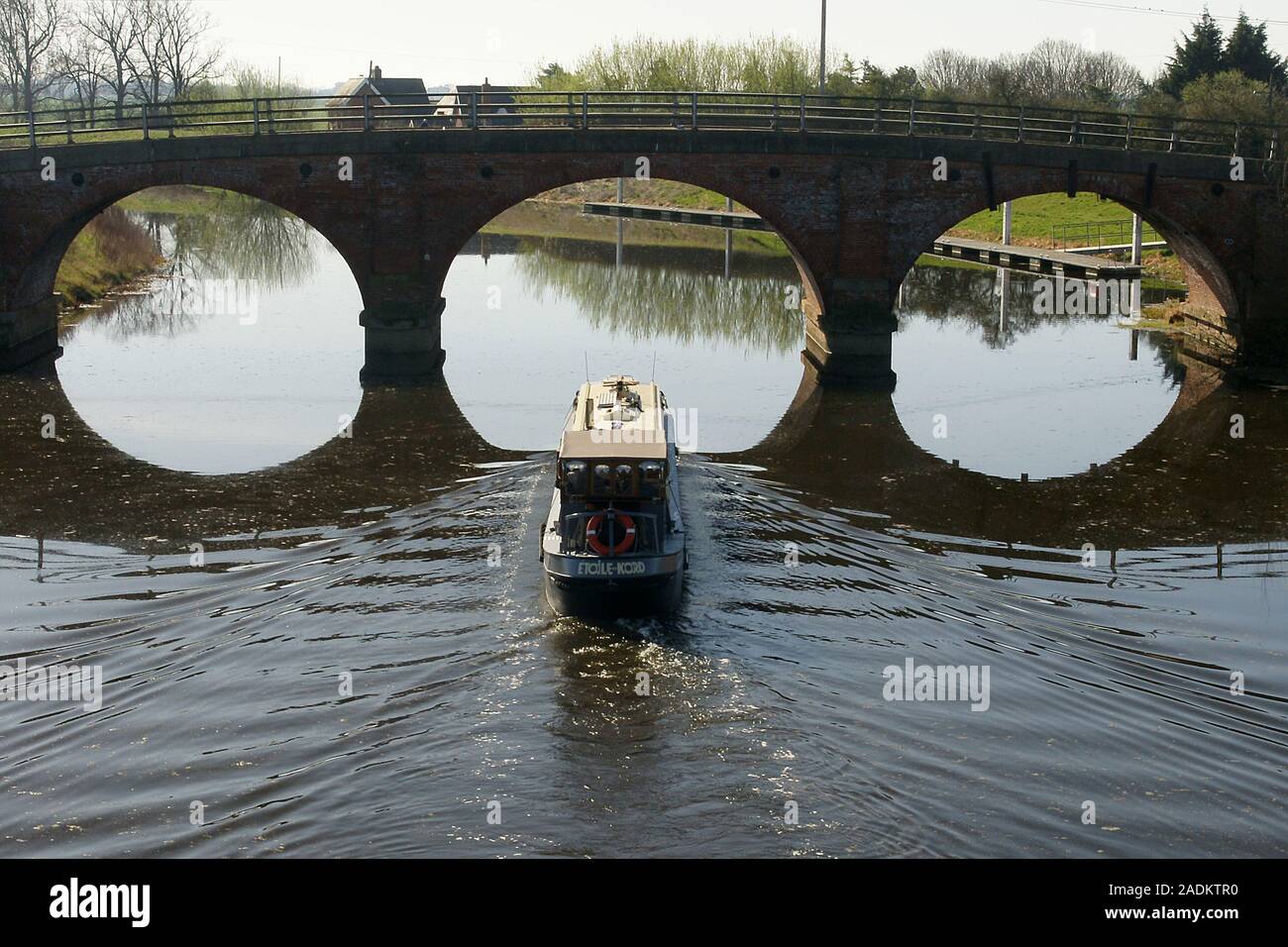 narrow boat at Tattershall bridge, Lincolnshire Stock Photo