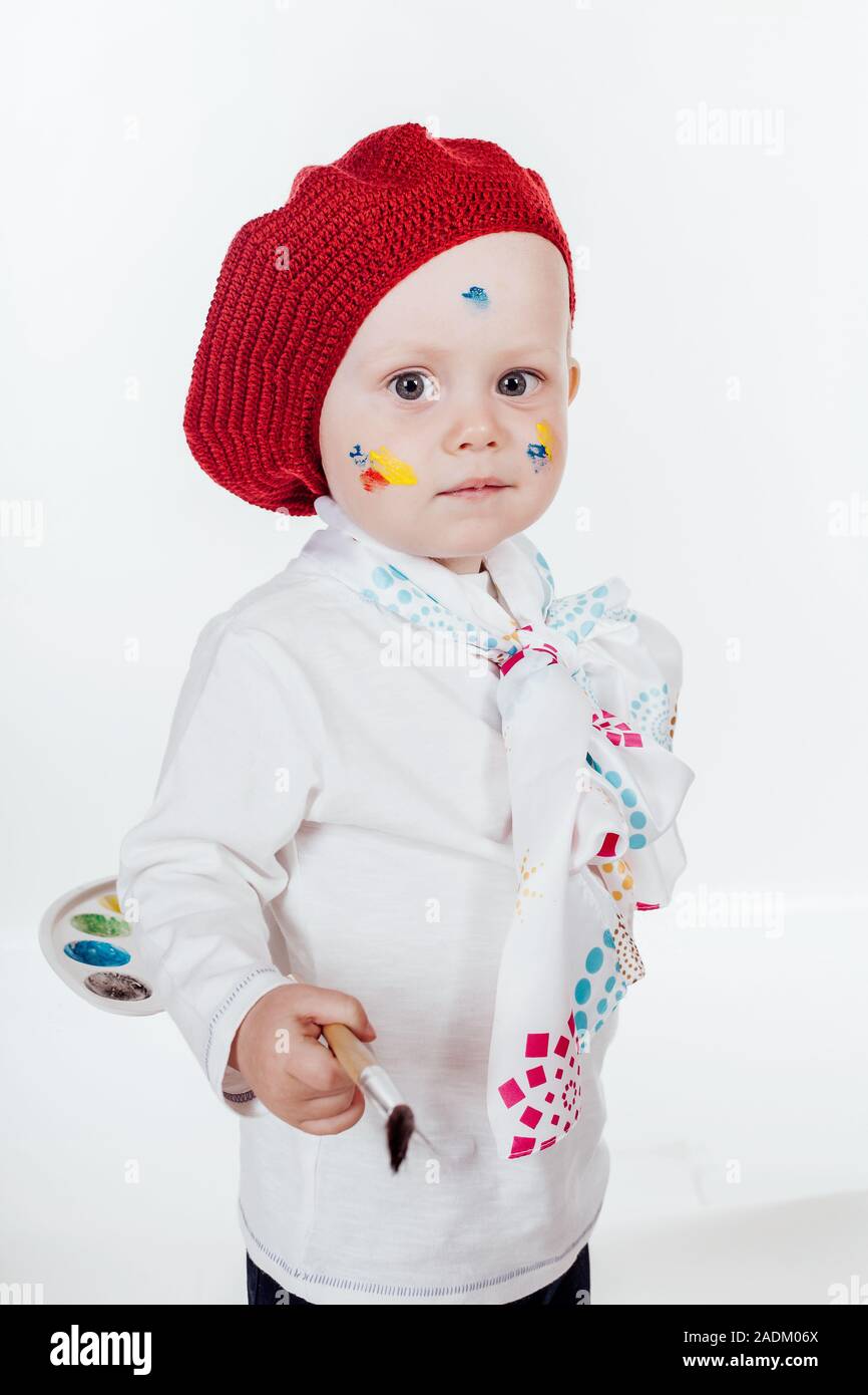 little boy artist with a brush and paints Stock Photo Alamy