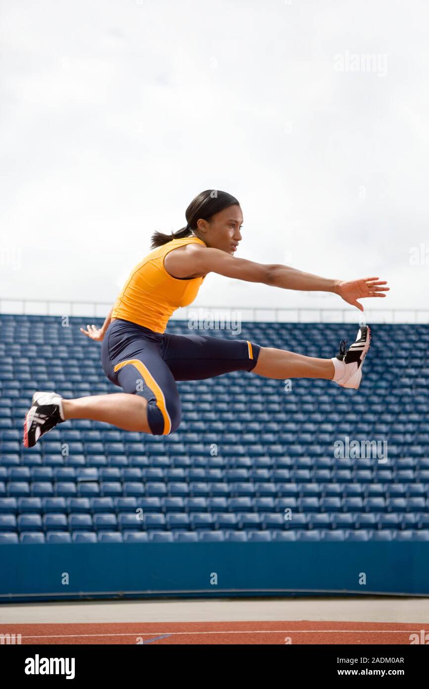 MODEL RELEASED. Airborne hurdler. Stock Photo