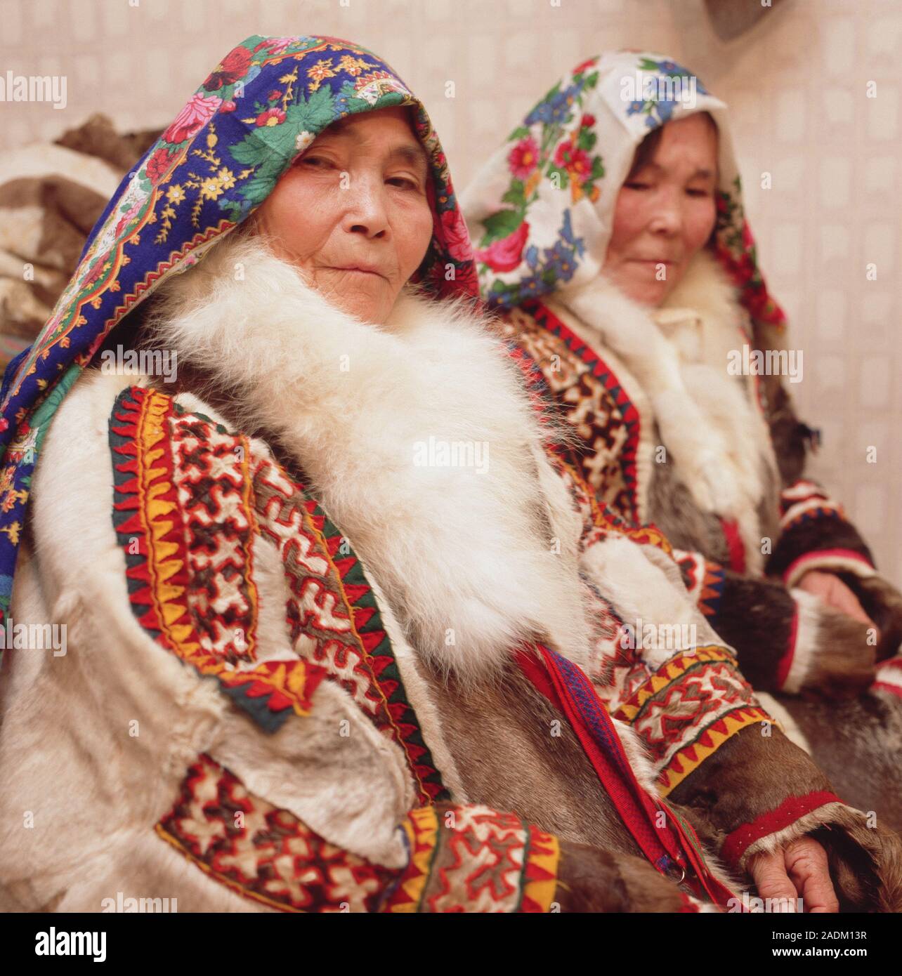 Khanty tribeswomen in traditional clothing made from animal skins. The