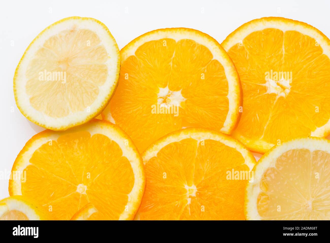 Slices of oranges and lemons, fruits full of juice with which juices