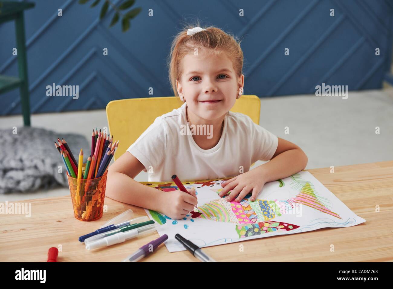 Cute Little Girl In Art School Draws Her First Paintings By