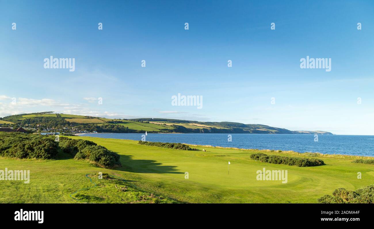 Fortrose & Rosemarkie Golf Club, 1st Hole looking back over the sea to the Clubhouse. Stock Photo