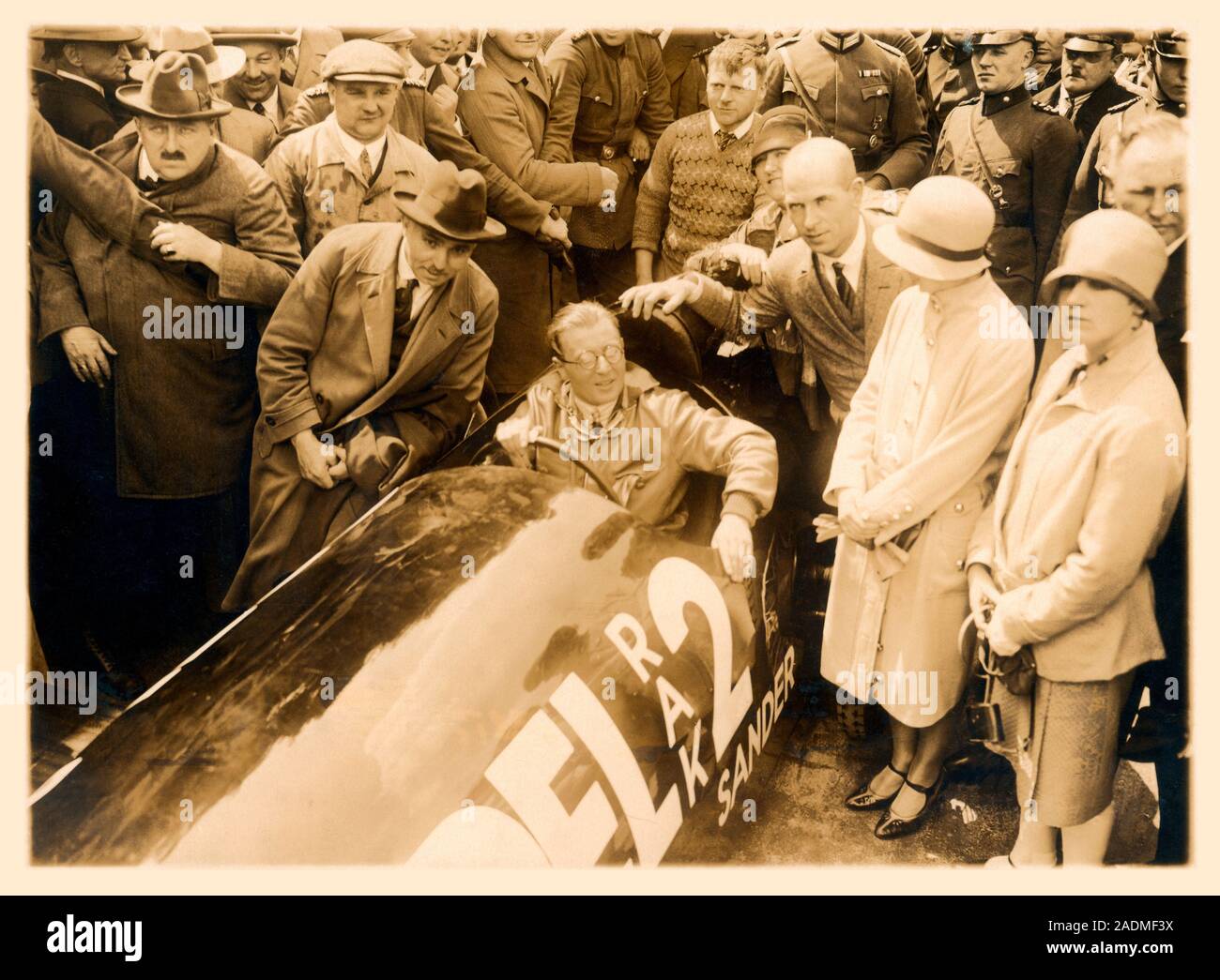 German rocket car. Opel RAK 2 rocket car in 1928. Fritz von Opel is in the car, with Max Valier holding the car with his right hand. Opel's first rock Stock Photo