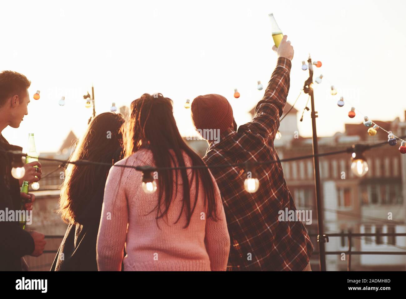 Say Hello To The Neighbors Holidays On The Rooftop Cheerful Group Of Friends Raised Their Hands Up With Alcohol Stock Photo Alamy Say Hello To The Neighbors Holidays On The Rooftop Cheerful Group Of Friends Raised Their Hands Up With Alcohol Stock Photo Alamy