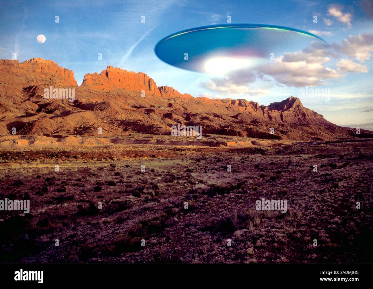 UFO. Computer artwork of an alien UFO (Unidentified Flying Object) flying over a rocky landscape in Utah, USA. Stock Photo