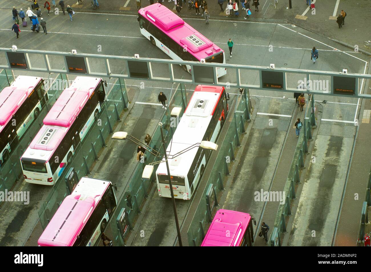 Nijmegen, Netherlands - November 22, 2019: Buses to transport people at Nijmegen station seen from above Stock Photo