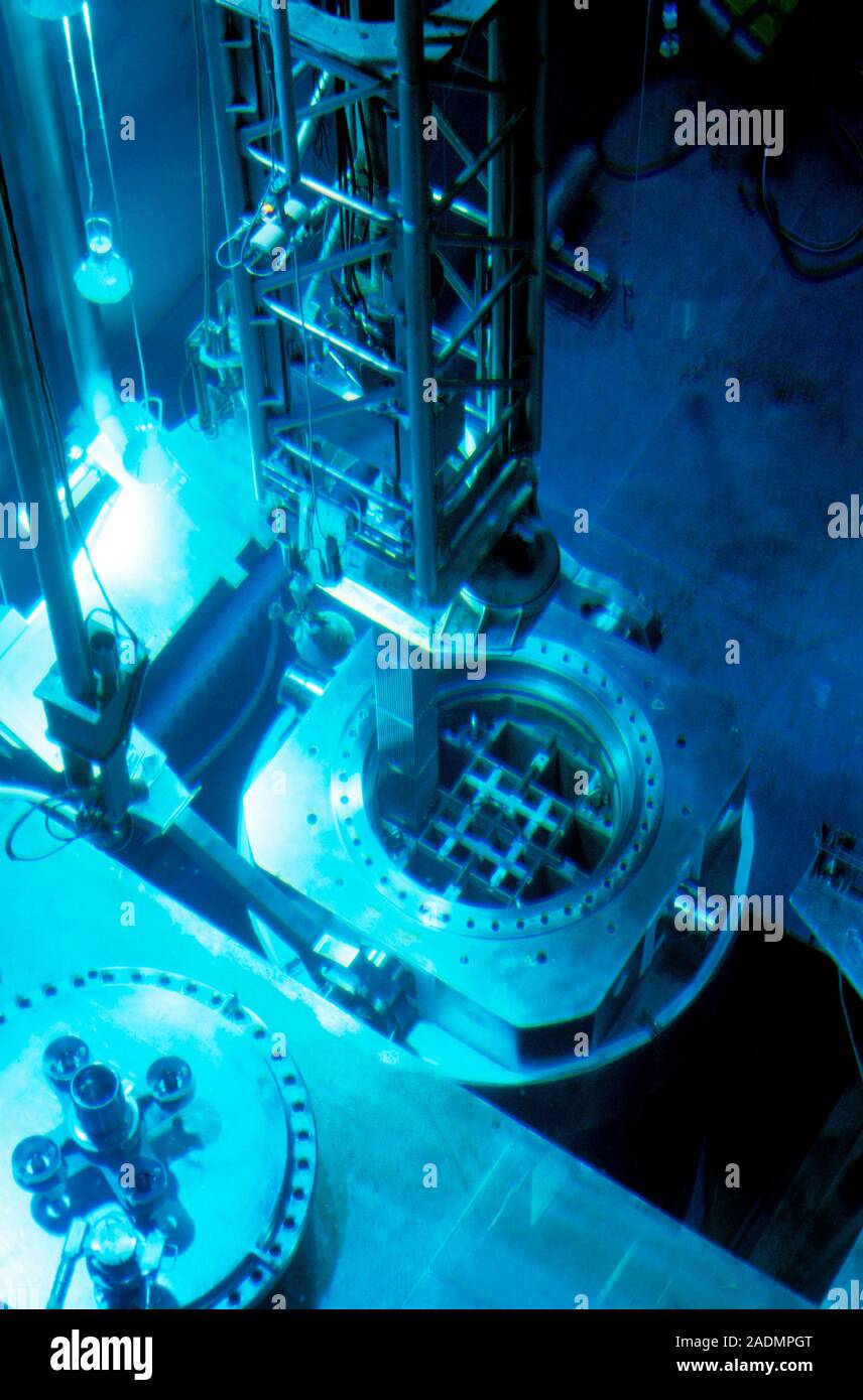 Nuclear fuel reprocessing. Nuclear fuel rod (centre) being removed by