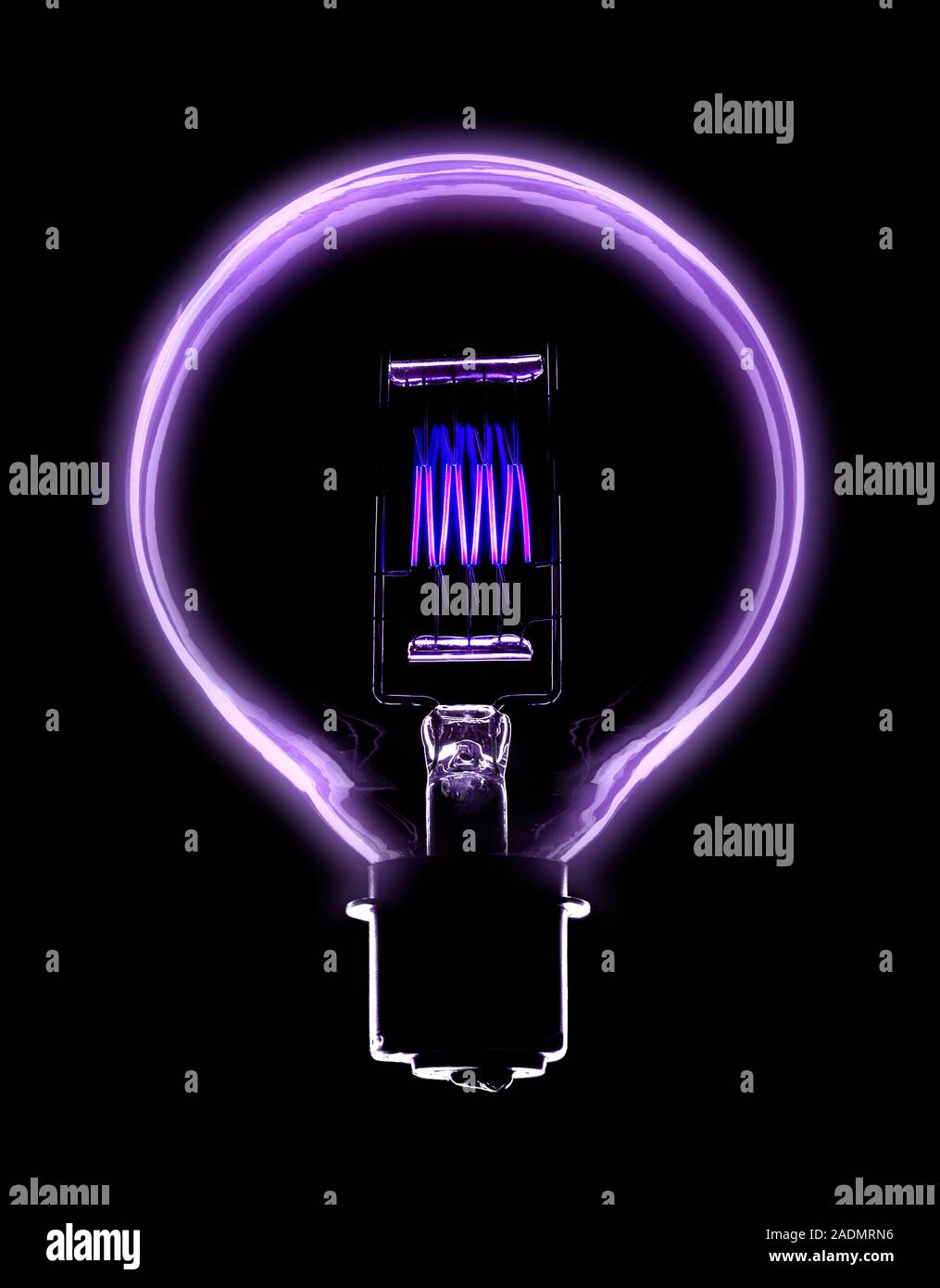 Incandescent light bulb filament. Glowing tungsten filament (centre