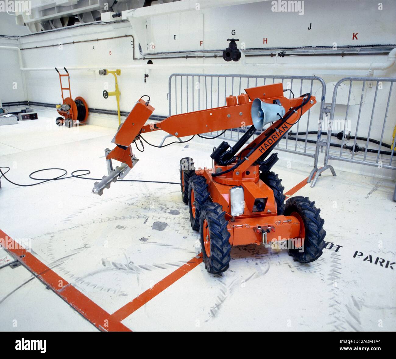 Robot. This robotic arm uses a hydraulics system to pick up items Stock