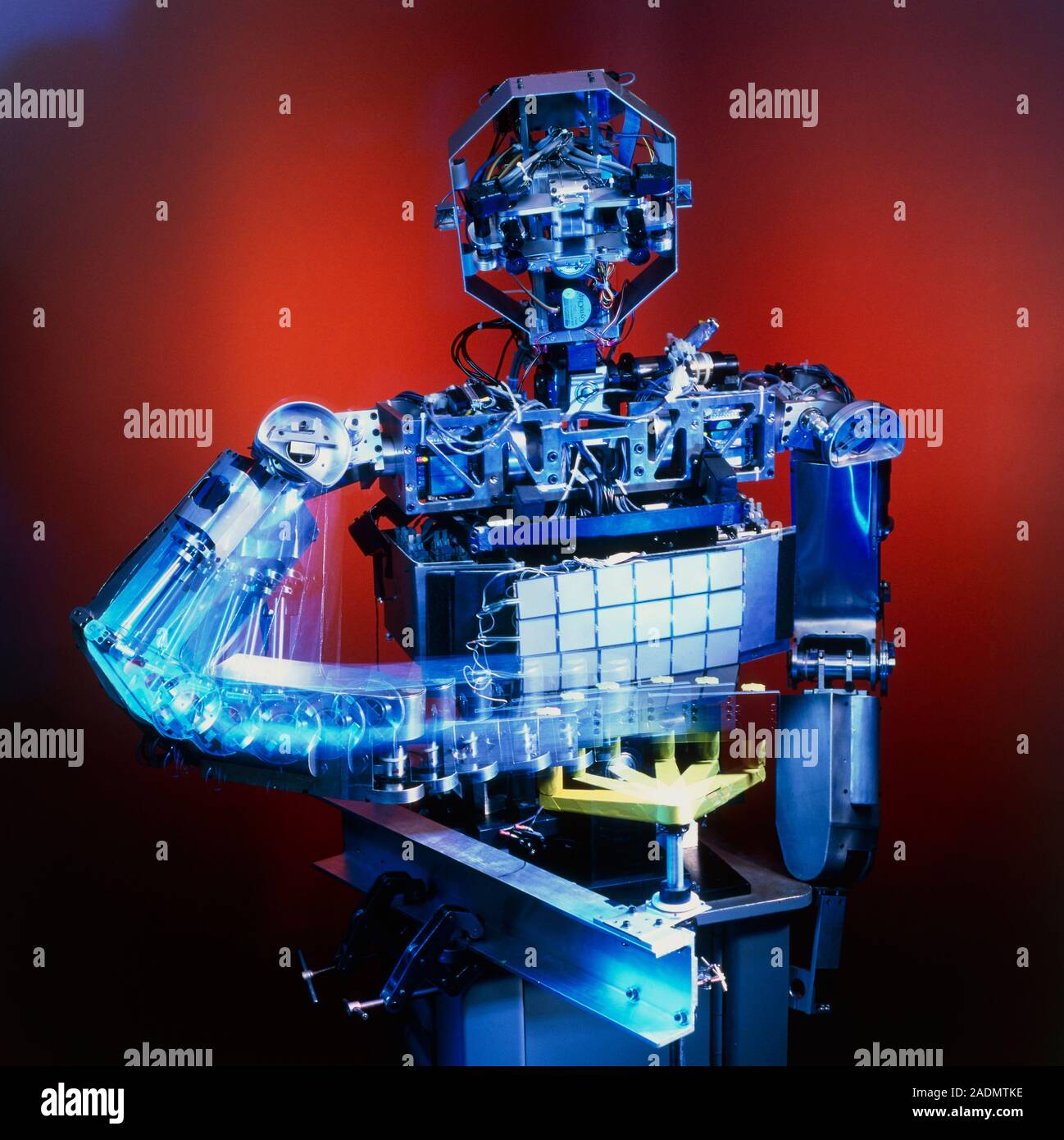 Android robot. View of an android robot named Cog winding a lever. Cog was  developed in order to learn how artificial intelligence is influenced by ha  Stock Photo - Alamy