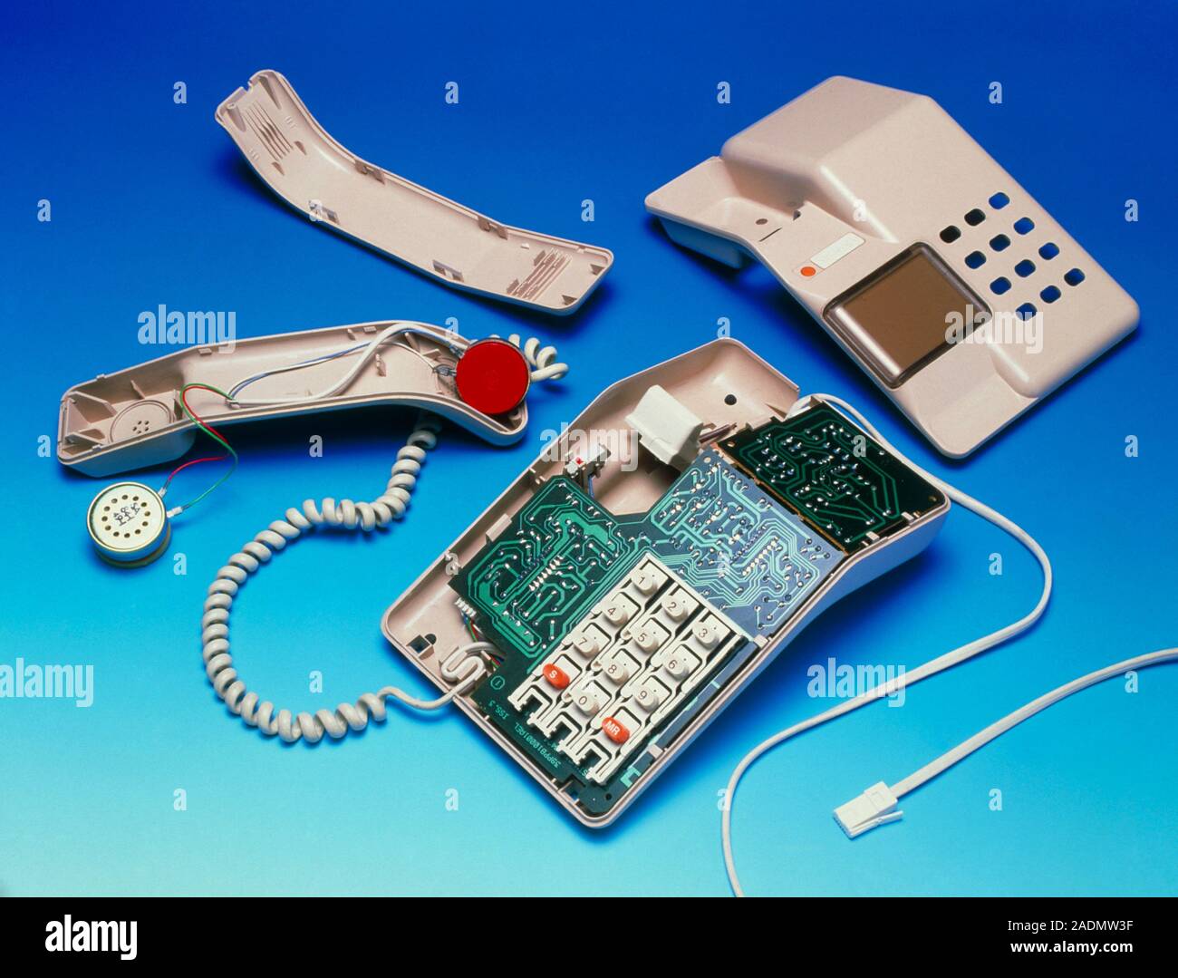 Telephone. Telephone and handset dismantled to show the circuitry that