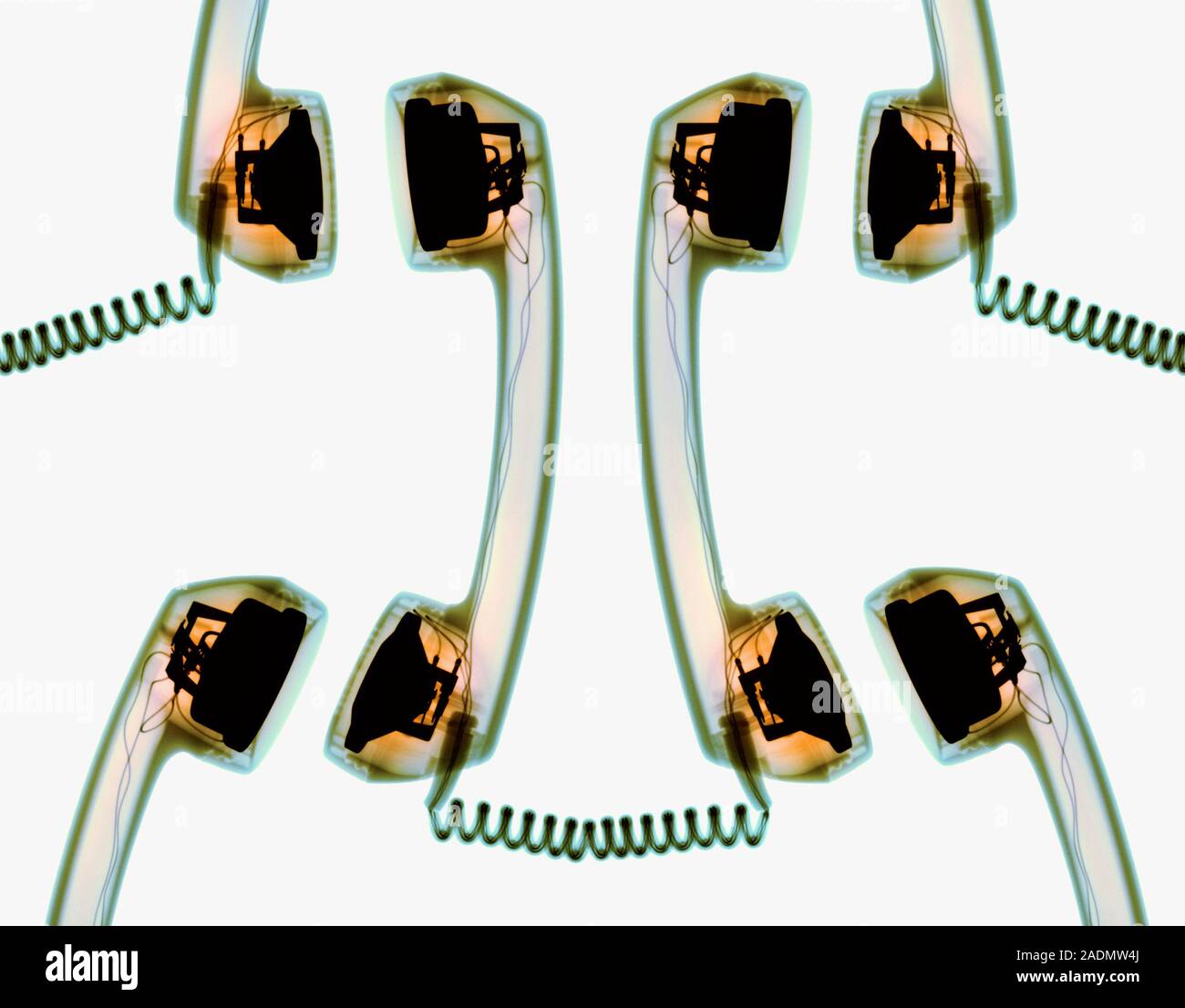 Networking. Conceptual coloured Xray of telephone handsets arranged