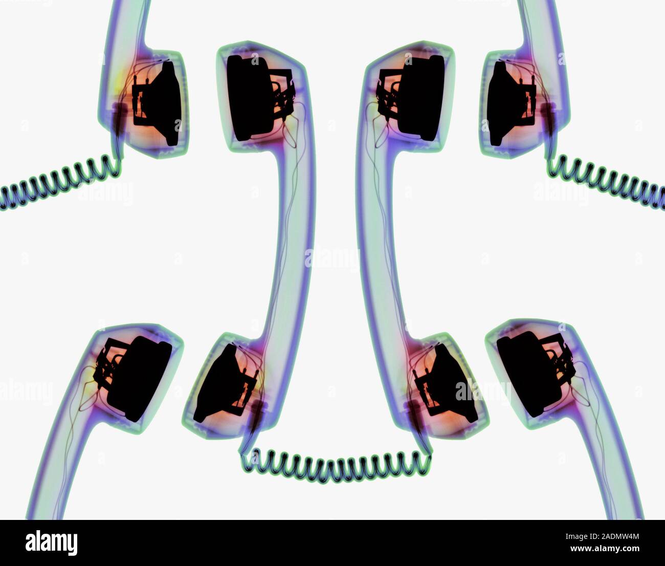 Networking. Conceptual coloured Xray of telephone handsets arranged