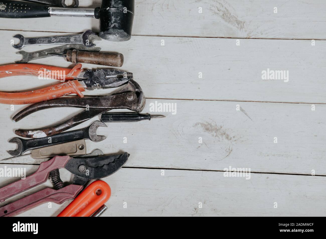tools for repairs lies on the white boards Stock Photo