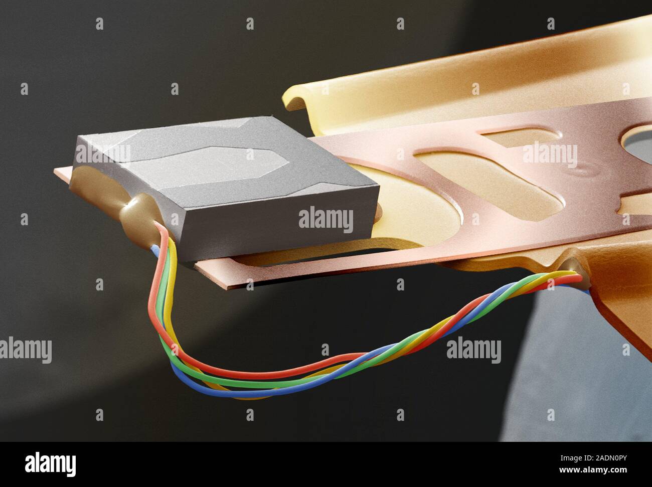 Computer hard disk read/write head. Coloured scanning electron ...