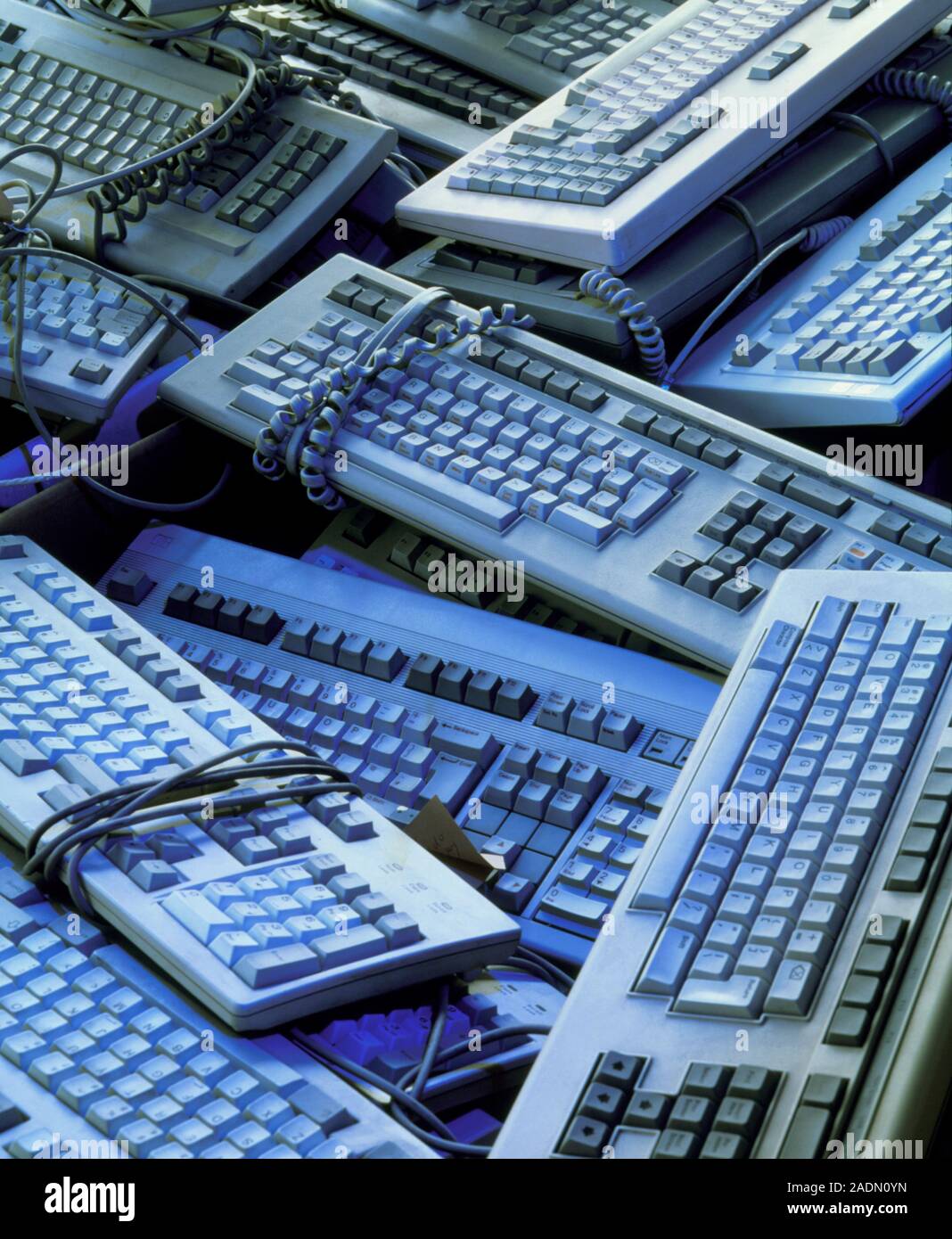 Computer keyboards. Piles of discarded, redundant computer keyboards