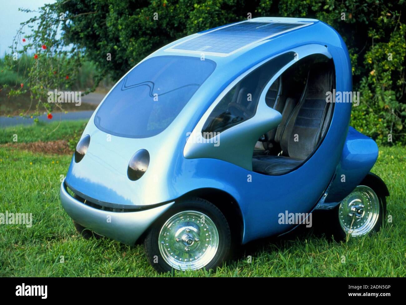 Electric car. Two-seater electric car. This car has an array of solar ...