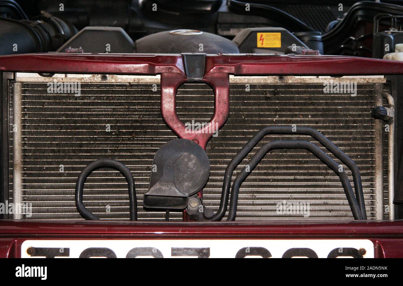 Car radiator grille. The radiator in a car's engine cools the engine