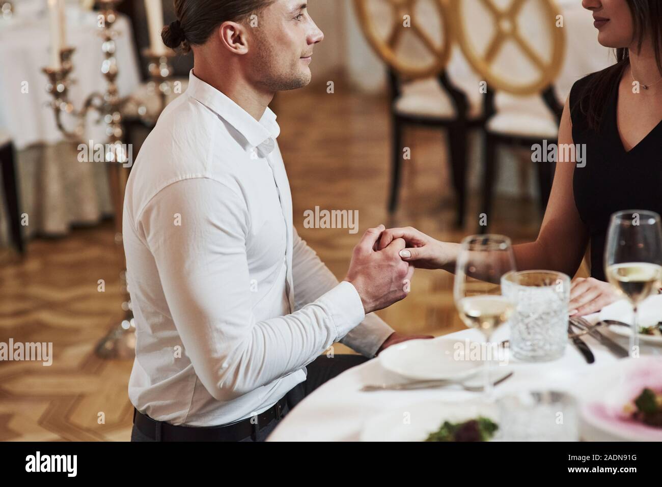 Guy wants to tell something important. Beautiful couple have romantic