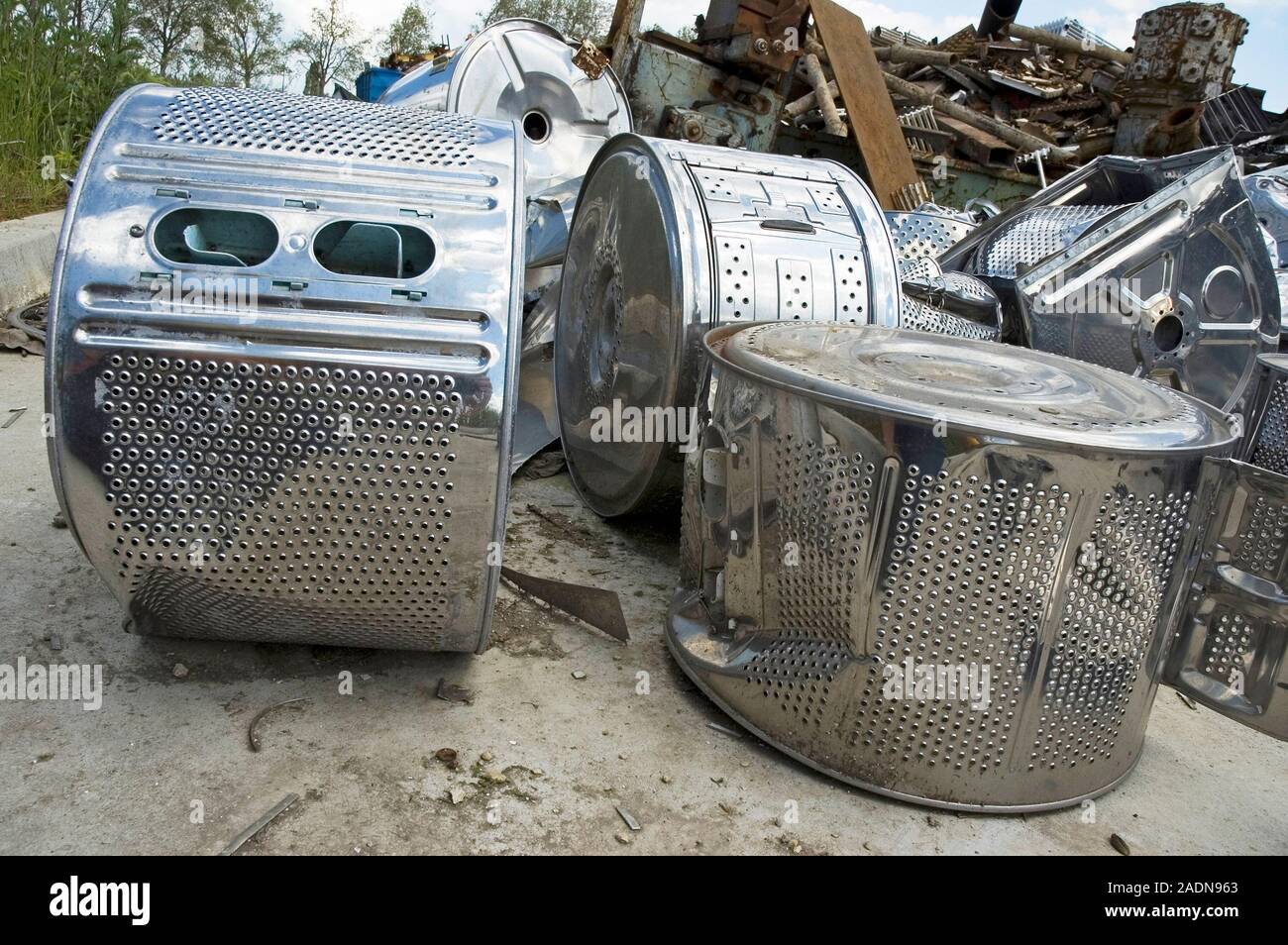Recycling waste metal. Washing machine drums awaiting processing at a