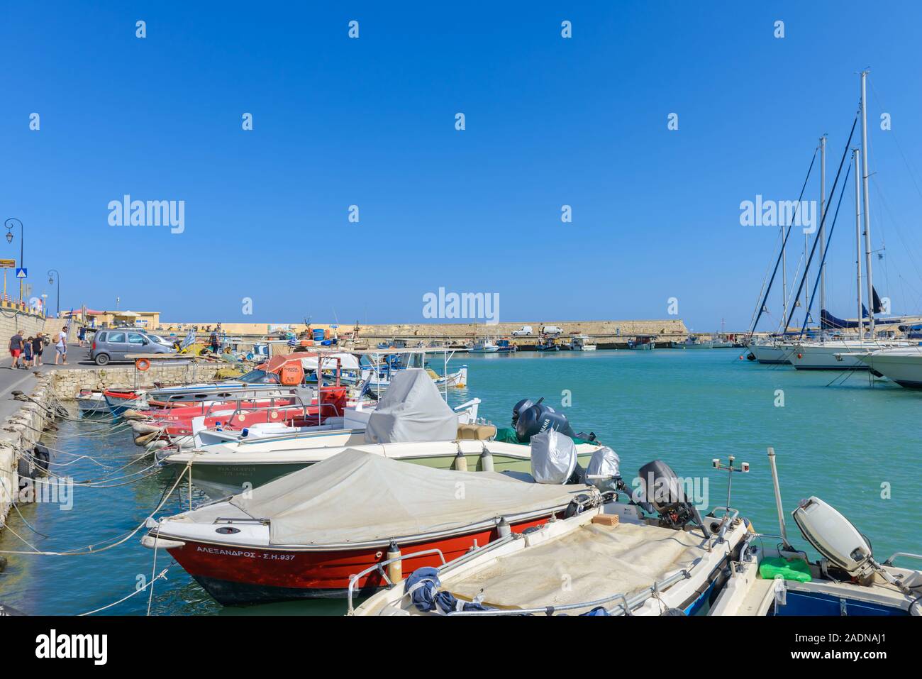 HERAKLION, GREECE. Crete. Fishing boats and a Venetian fortress in the Harbor of Heraklion. August 2017 Stock Photo