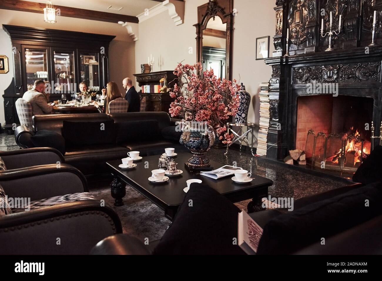 Ordinary day for these people. Family friends having nice time in beautiful luxury modern restaurant Stock Photo