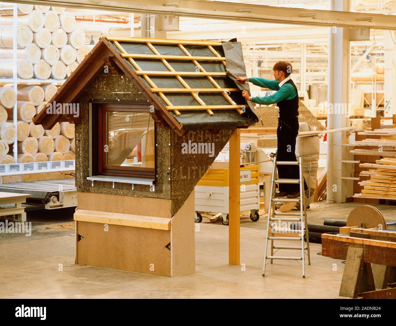 Prefabricated window. Carpenter works on building a prefabricated ...