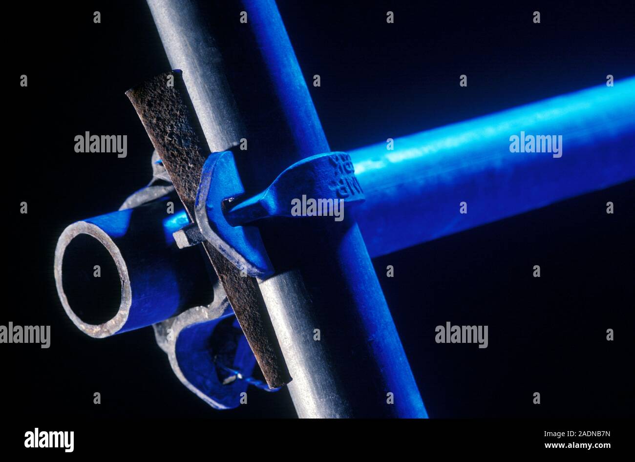 Scaffold coupler on scaffold tubes. A coupler is a fixing used to hold