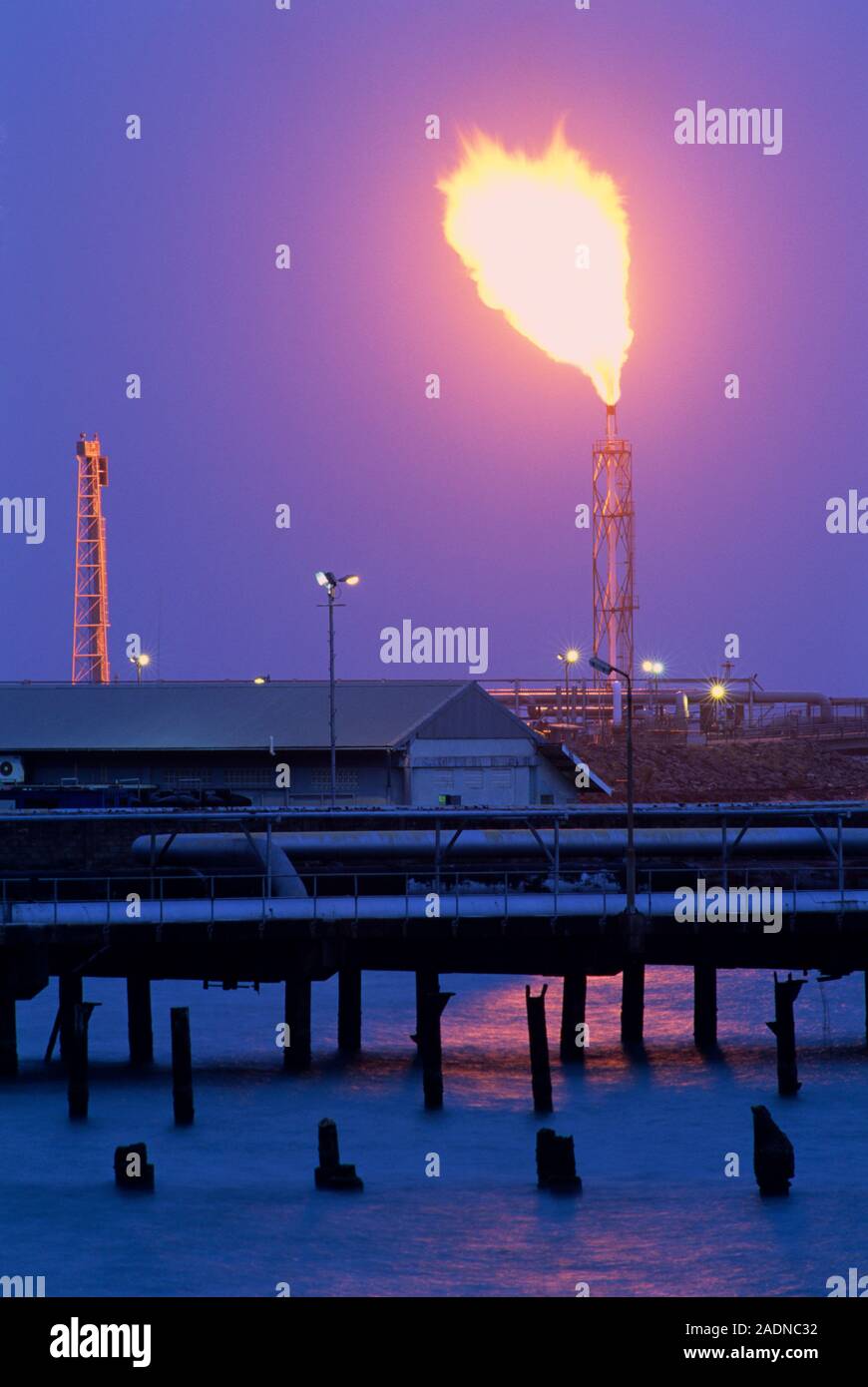 Gas flare at a petroleum plant. During processing, small volumes of