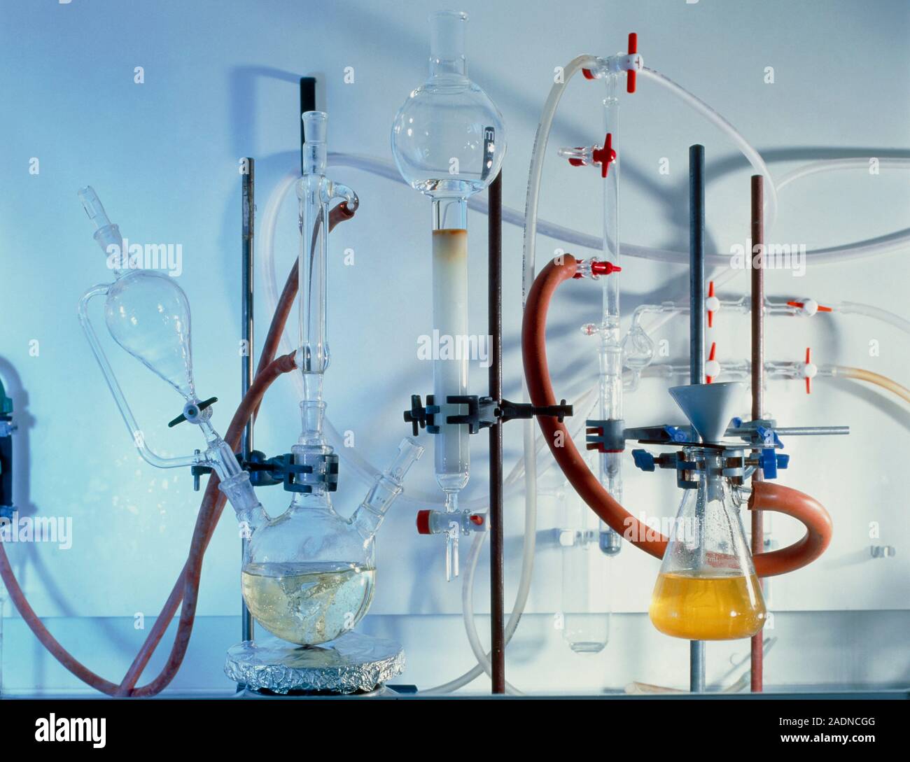 Chemistry equipment. Reflux equipment is at left. Reactants are mixed