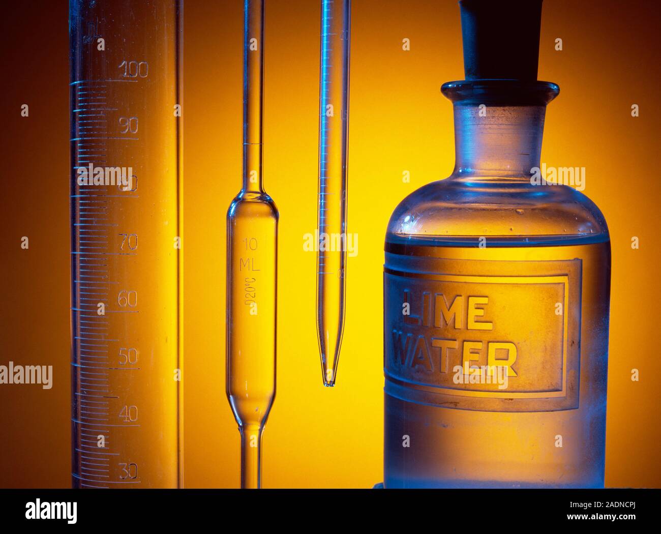 Etched laboratory glassware. Measuring cylinder, pipette tubes and a