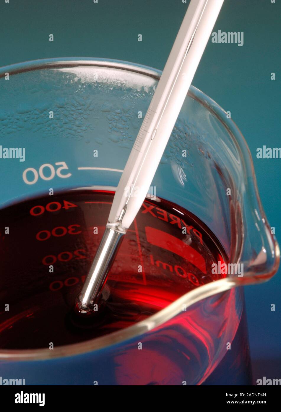 Thermometer being used in a laboratory. The bulb of the thermometer is