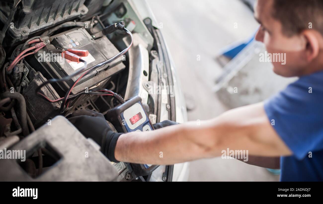 Car master mechanic repairer checking and testing automotive