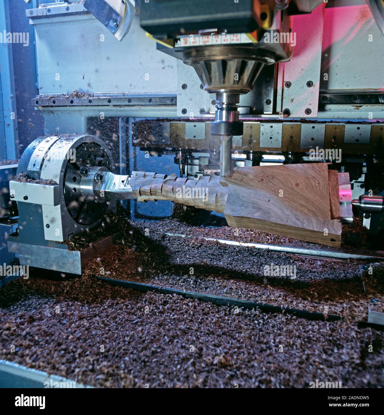 Gun manufacture. Computercontrolled lathe shaping a beretta pistol