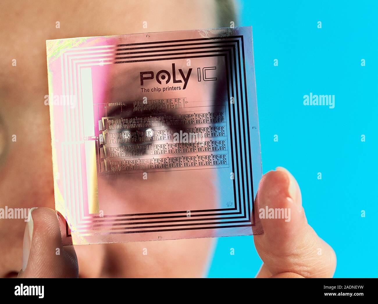 Intelligent label chip. Woman looking through a radio frequency