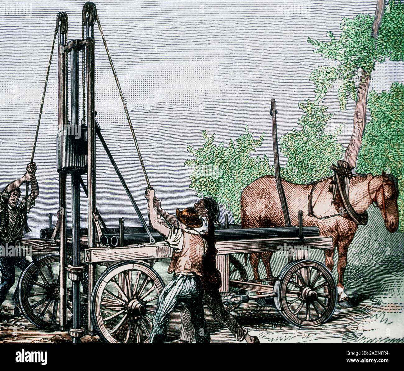 First Drilling Rig Oil well boring rig. Coloured historical engraving of workers operating ...
